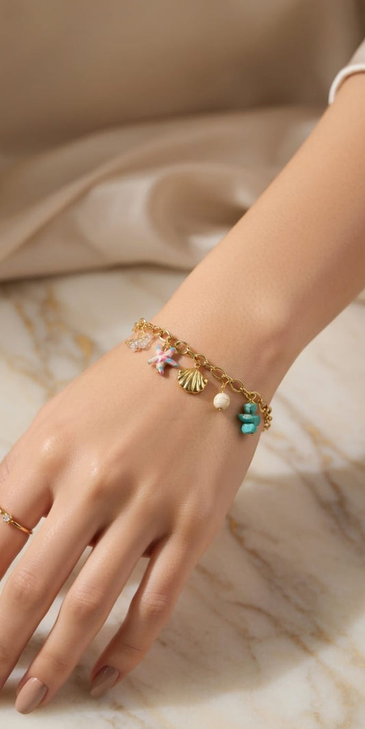 Cute 18K Gold Sea Charm Bracelet – Shell & Starfish Design