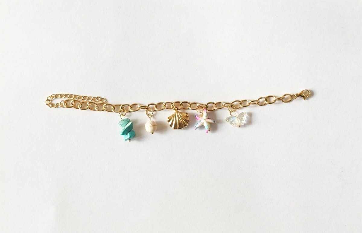 Cute 18K Gold Sea Charm Bracelet – Shell & Starfish Design